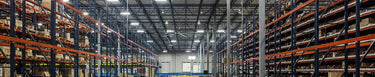 NF Sports facility warehouse stacked with boxes and inventory
