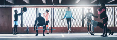 Gym workout scene with seven people performing fitness exercises